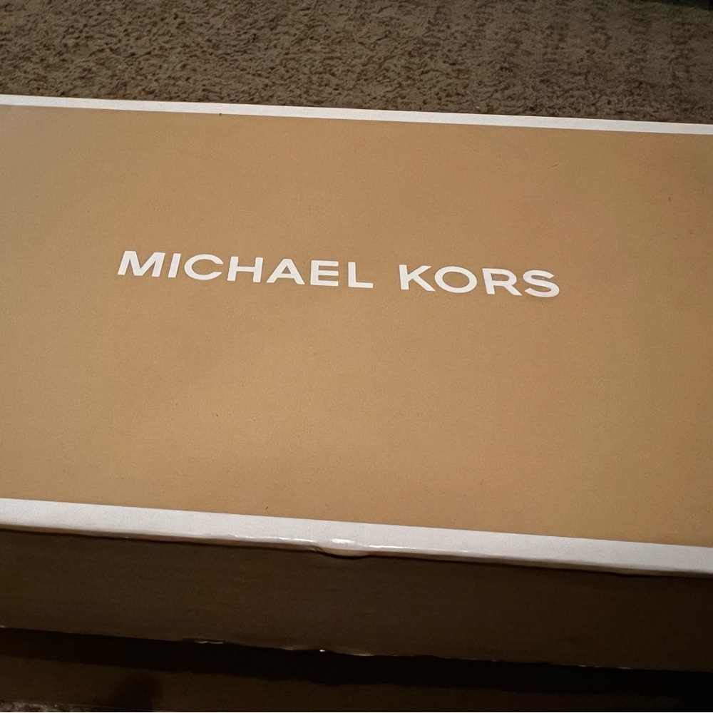 Brand new Michael Kors size 10 loafers